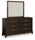 Neymorton King Upholstered Panel Bed with Mirrored Dresser, Chest and Nightstand