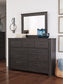 Brinxton Queen/Full Panel Headboard with Mirrored Dresser and Chest