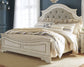 Realyn California King Upholstered Panel Bed with Dresser